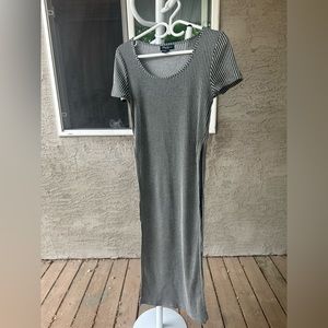 A grey crop top, very long side slits, size is US M from Societystreet wear